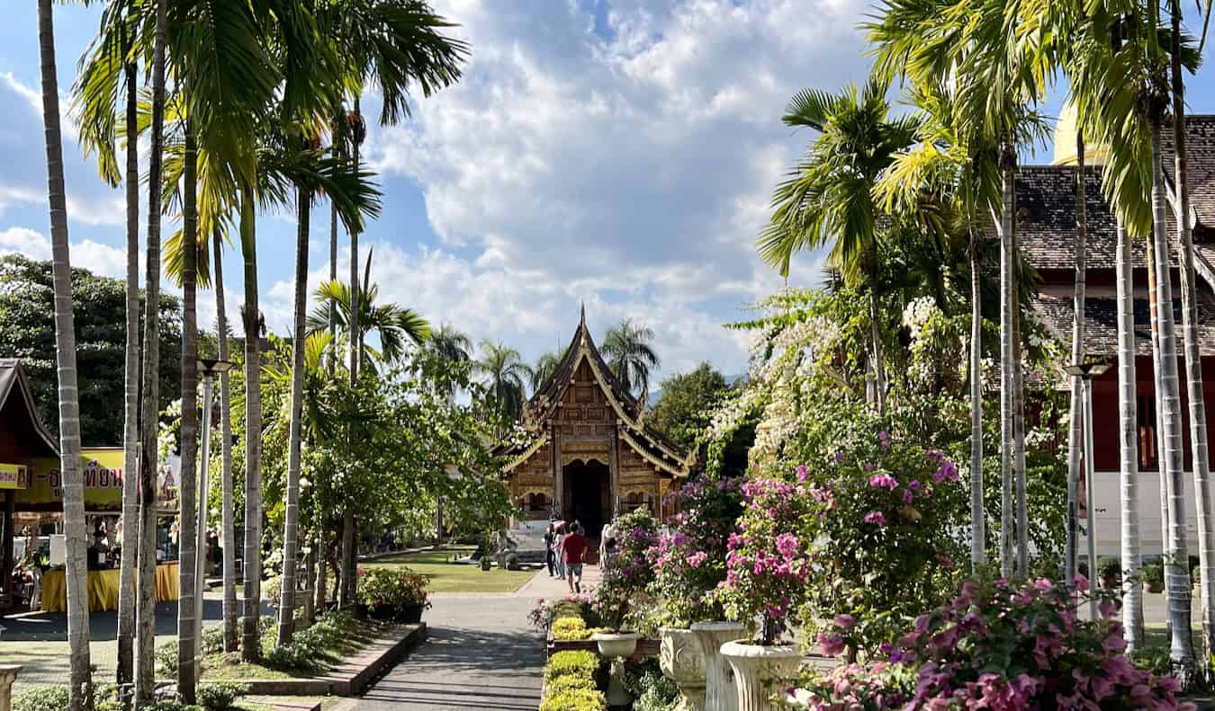 A historic temple in the distance while exploring Chiang Mai, Thailand on a sunny day